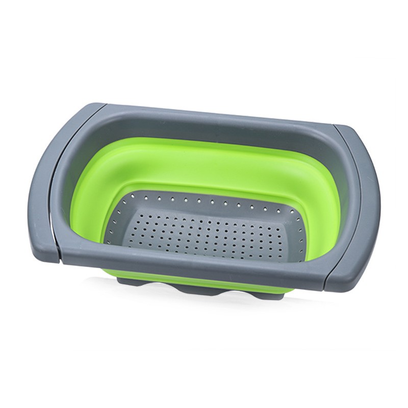Colador de silicona plegable y extensible verde.