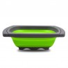 Colador de silicona plegable y extensible verde.