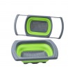 Colador de silicona plegable y extensible verde.